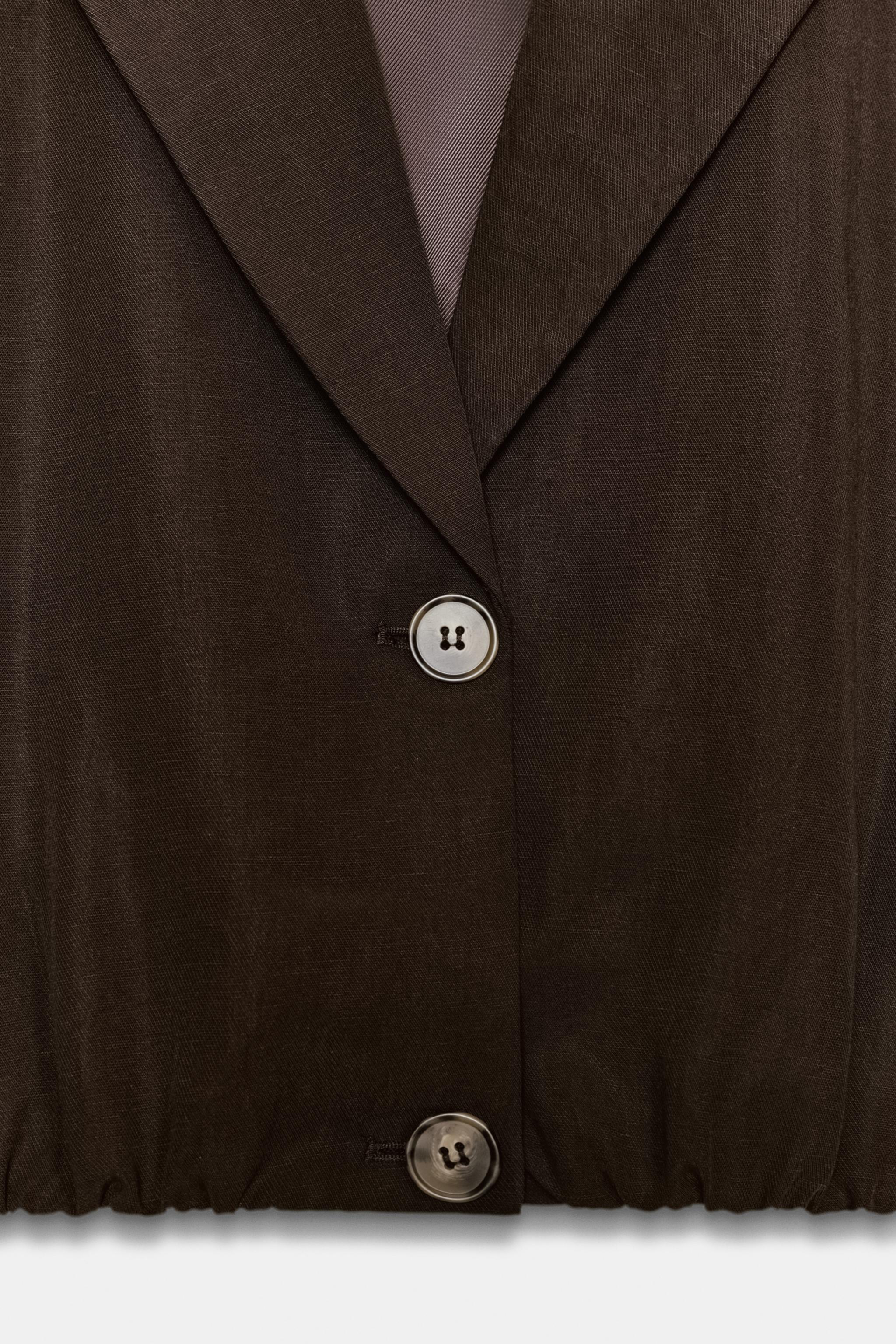 VESTE COURTE À BAS ÉLASTIQUE